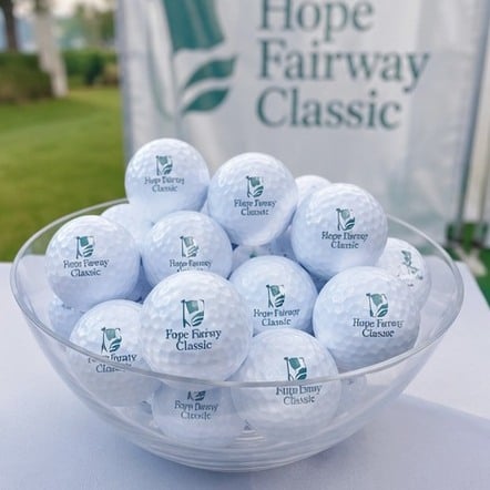 Customized golf balls for charity scrambles and tournaments