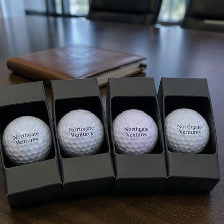 Customized golf balls for corporate outings and client gifts